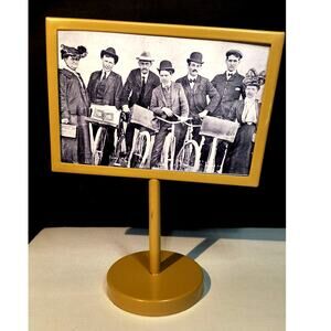 1153.  Gold Tone Pedestal Picture Frame